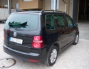  Poškozené zadní sklo VW Touran